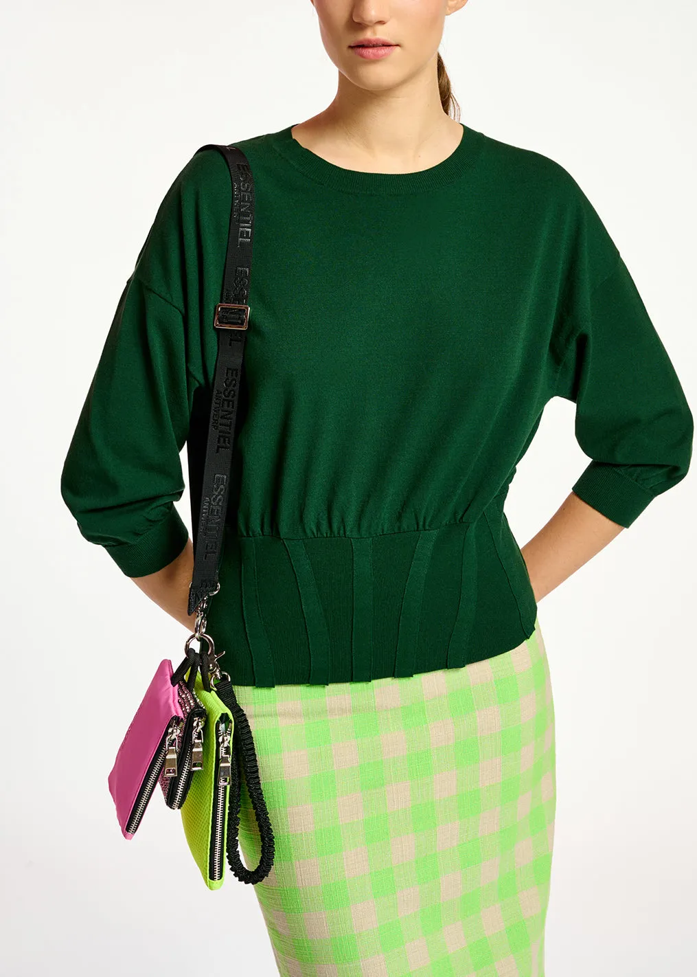 Dark green knitted sweater with fitted waist