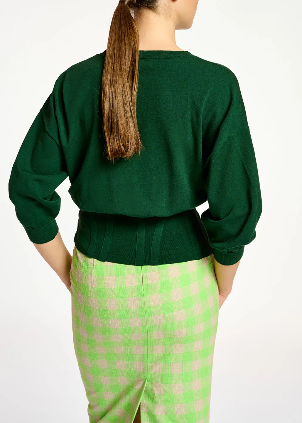 Dark green knitted sweater with fitted waist