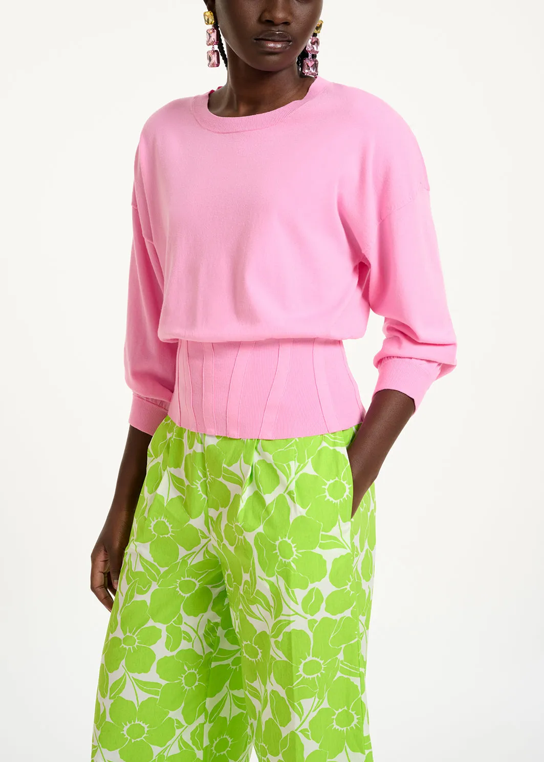 Light pink knitted sweater with fitted waist