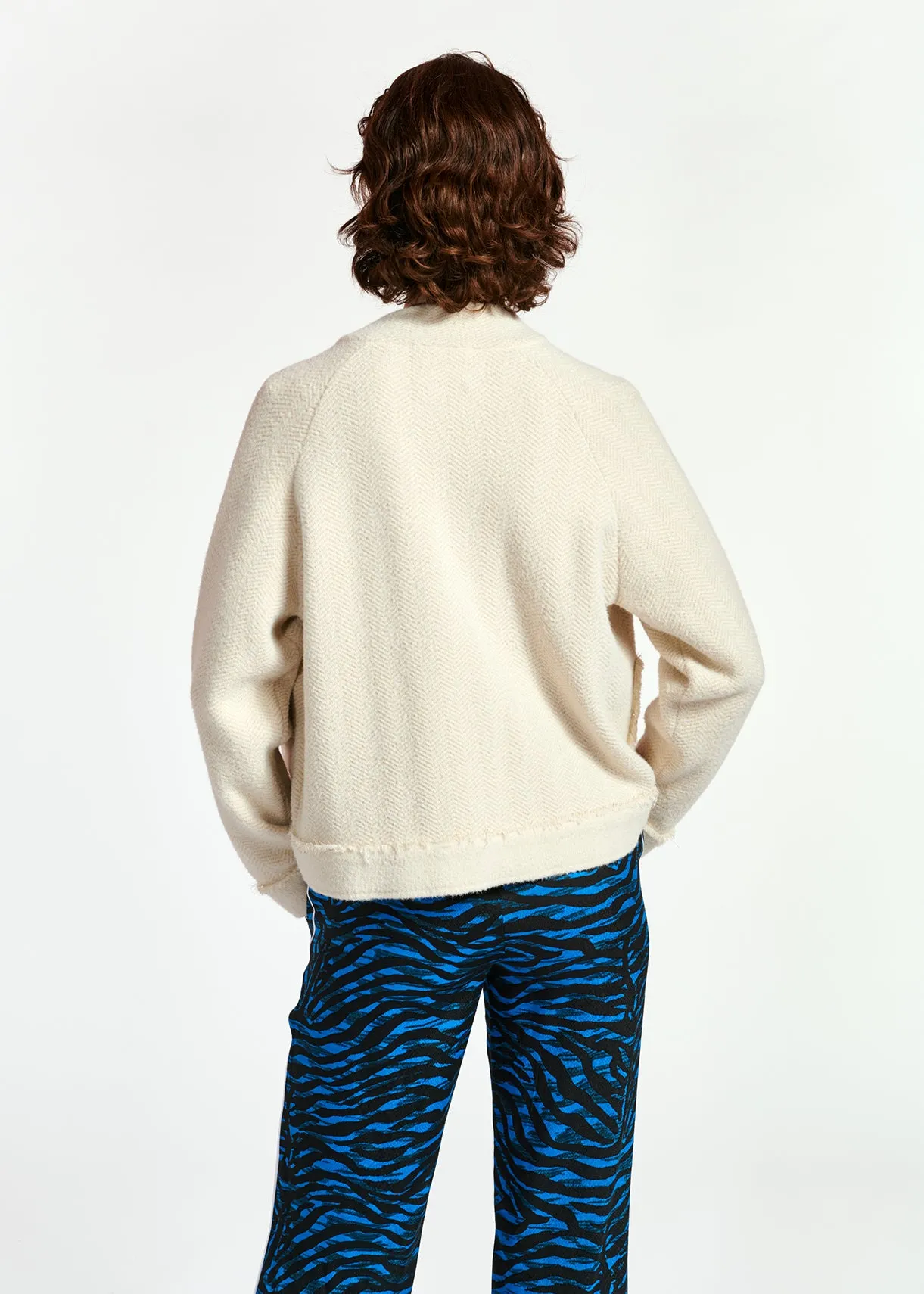 Off-white knitted short jacket with lurex details