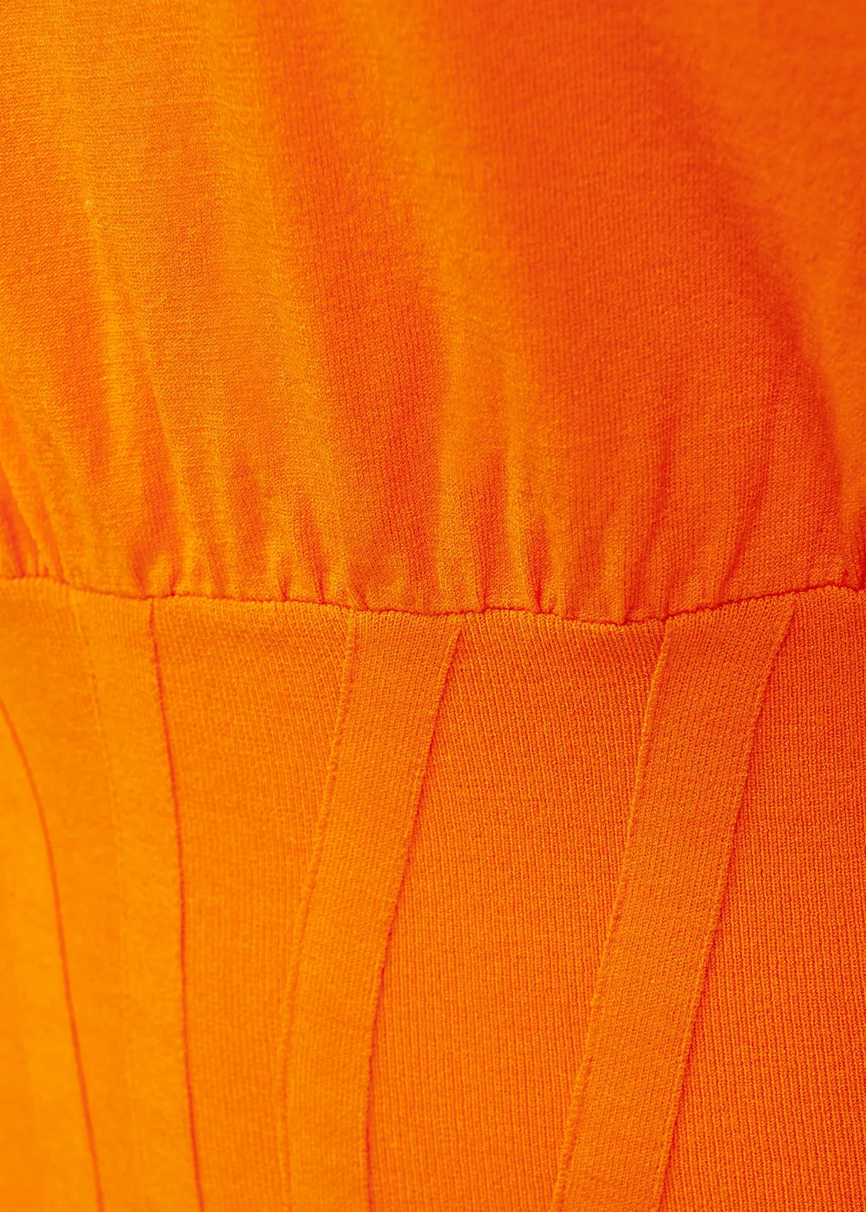 Orange knitted sweater with fitted waist