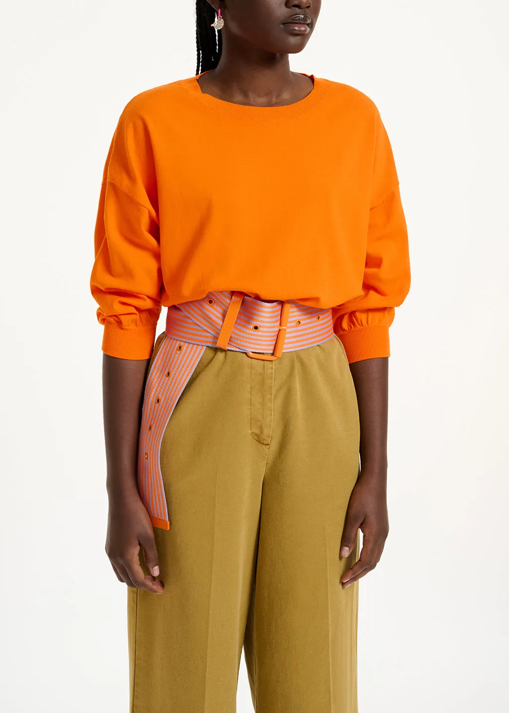 Orange knitted sweater with fitted waist