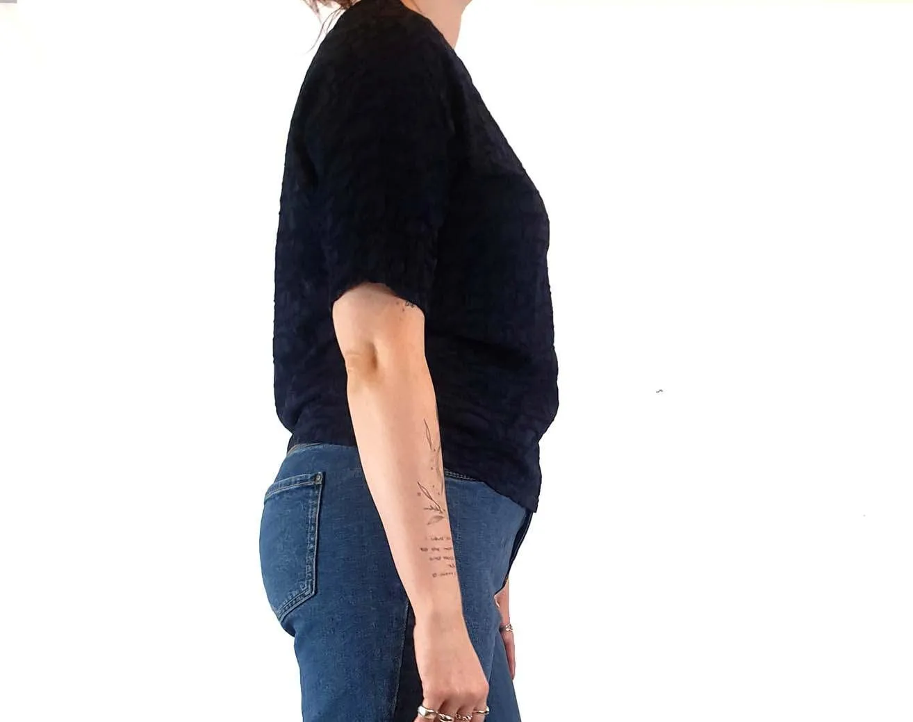 Textured navy top with cute front pockets best fits size 12