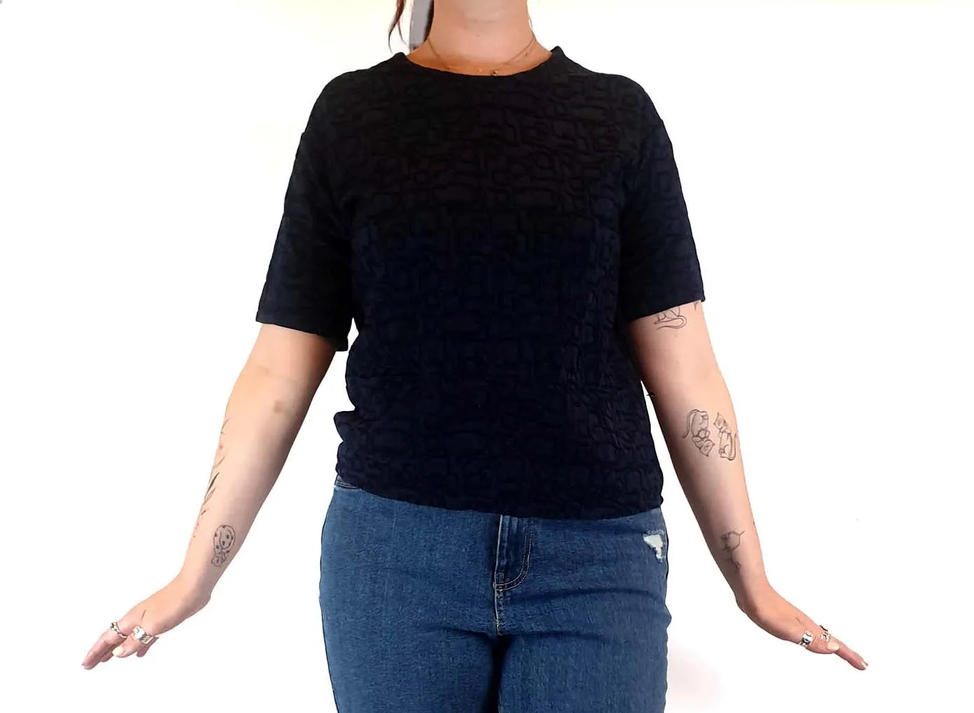 Textured navy top with cute front pockets best fits size 12