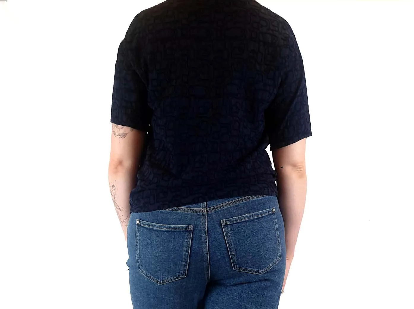 Textured navy top with cute front pockets best fits size 12