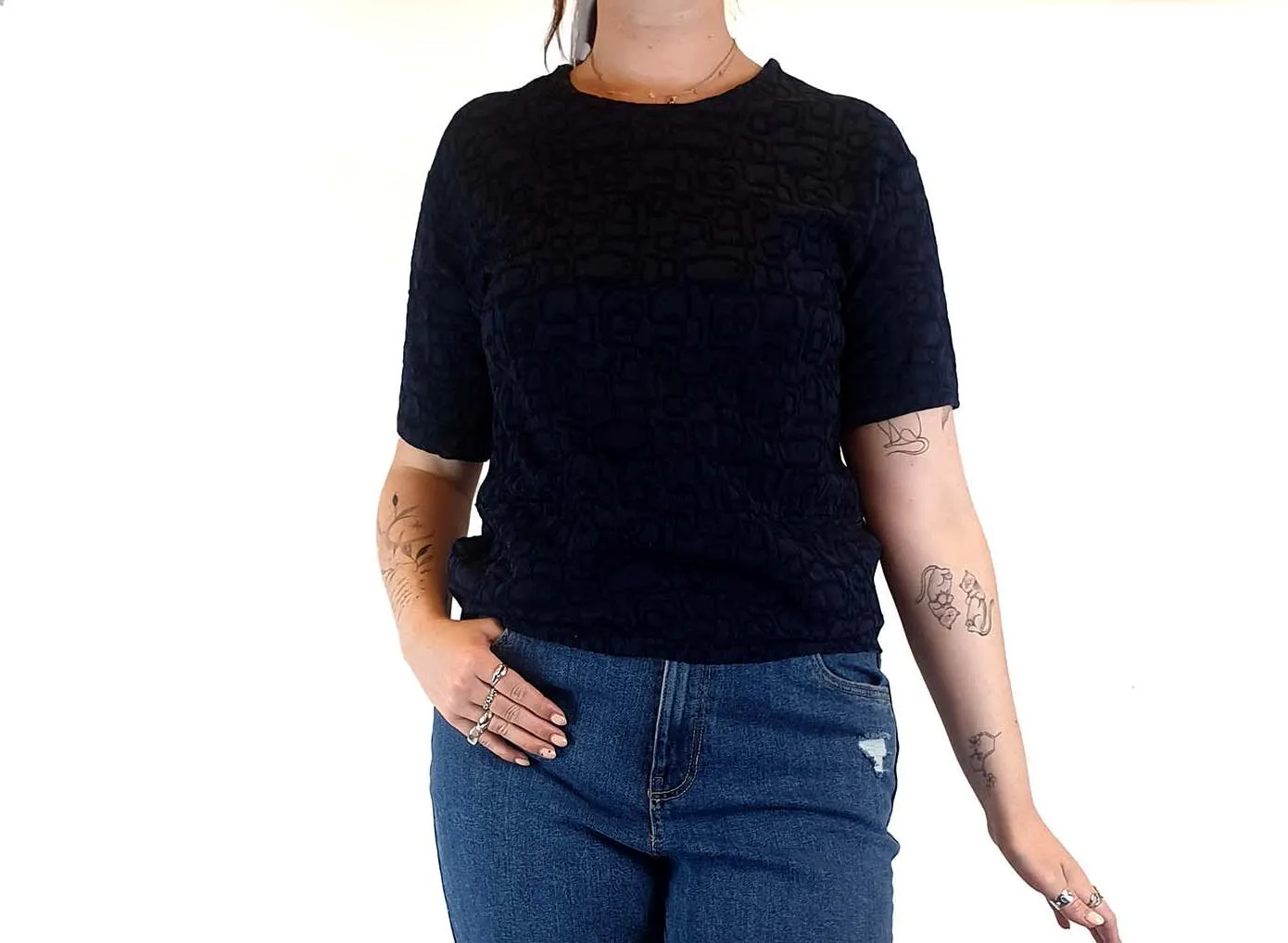 Textured navy top with cute front pockets best fits size 12